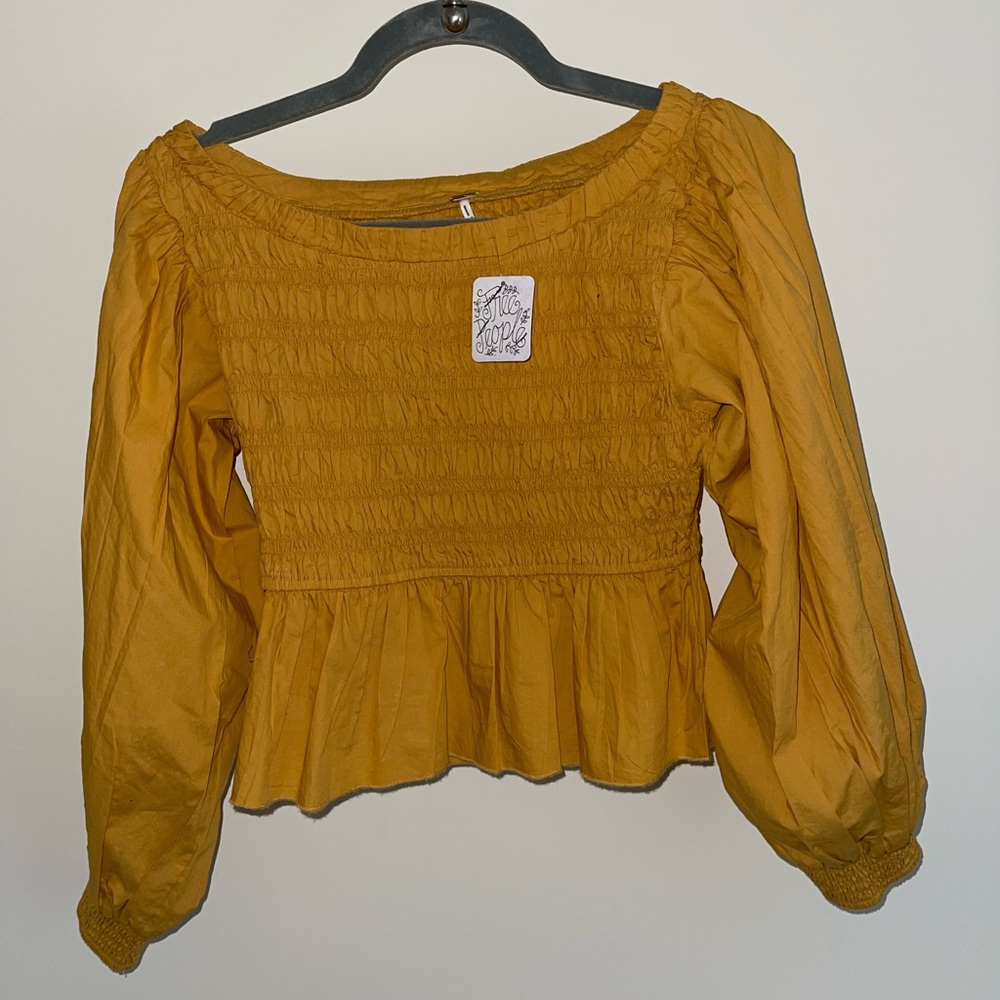 Free people. Size small. Mustard yellow crop top.